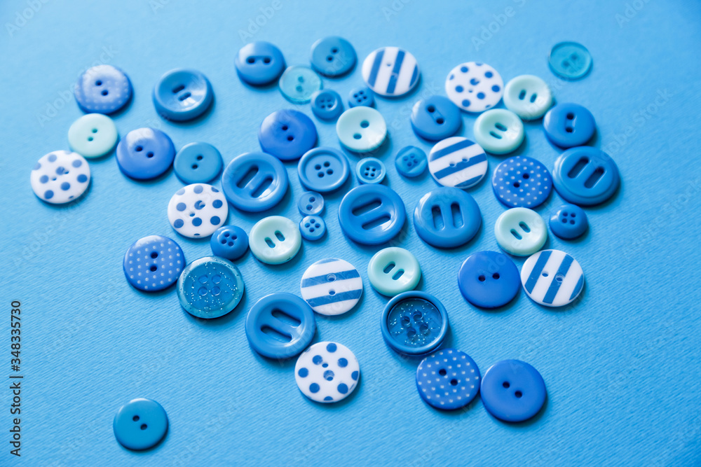 Flat lay with colorful sewing buttons, mock up, top view. Flat lay with colorful sewing buttons, mock up, top view.