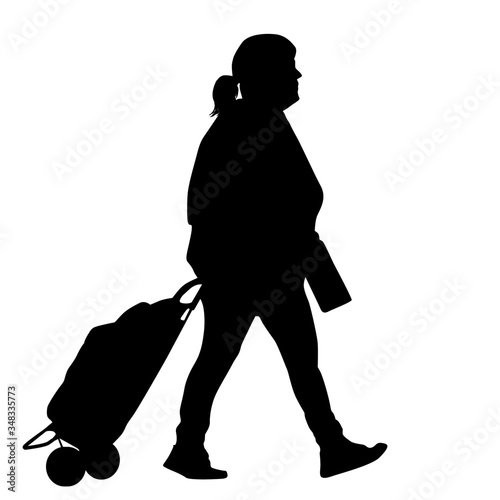 Woman silhouette with luggage