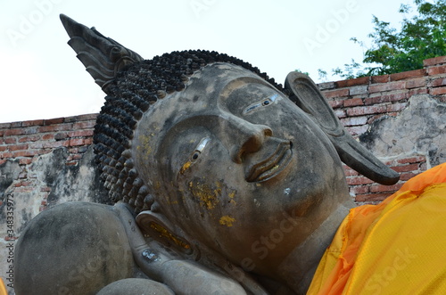 Huge reclining buddha statue at Wat Phutthai Sawan in Ayutthaya photo