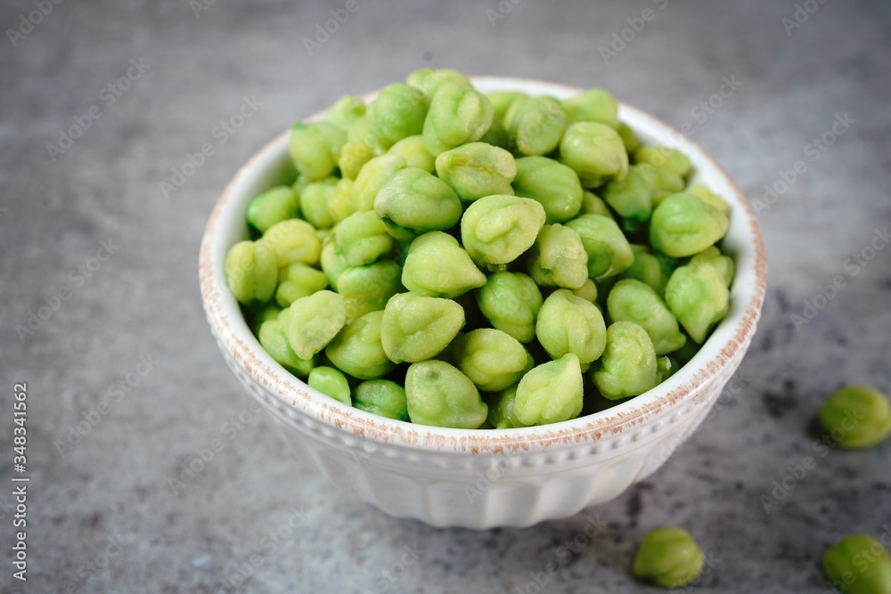 Green Chickpeas or Garbanzo beans in a bowl with copy space Green Chickpeas or Garbanzo beans in a bowl with copy space