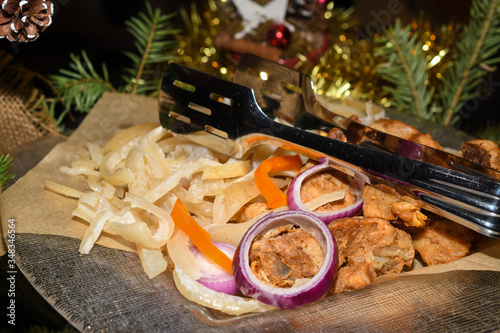 Romanian traditional Christmas food buffet with sorici, caltabos, toba and pork meat cuts, ham photo