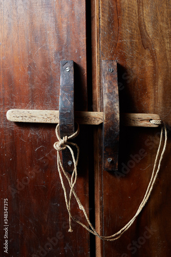 Obsolete wooden door bolt, Thai tradition