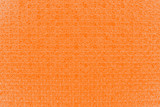 Orange color crystal glittering texture background. Glittery shiny lights
