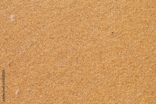 Textured wet sand beach background