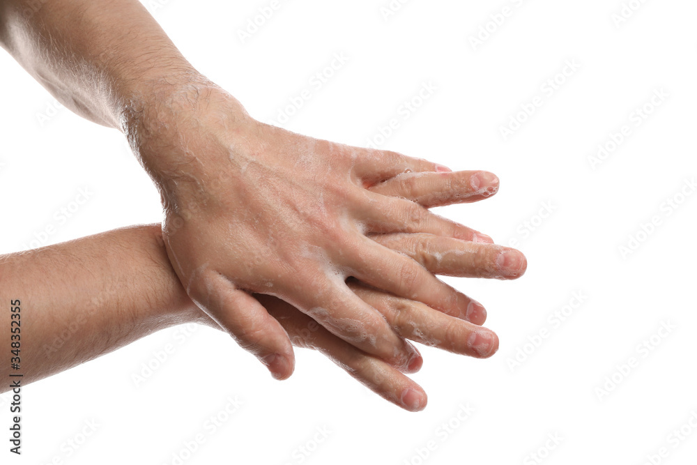 Man washing hands with soap on white background, closeup Man washing hands with soap on white background, closeup