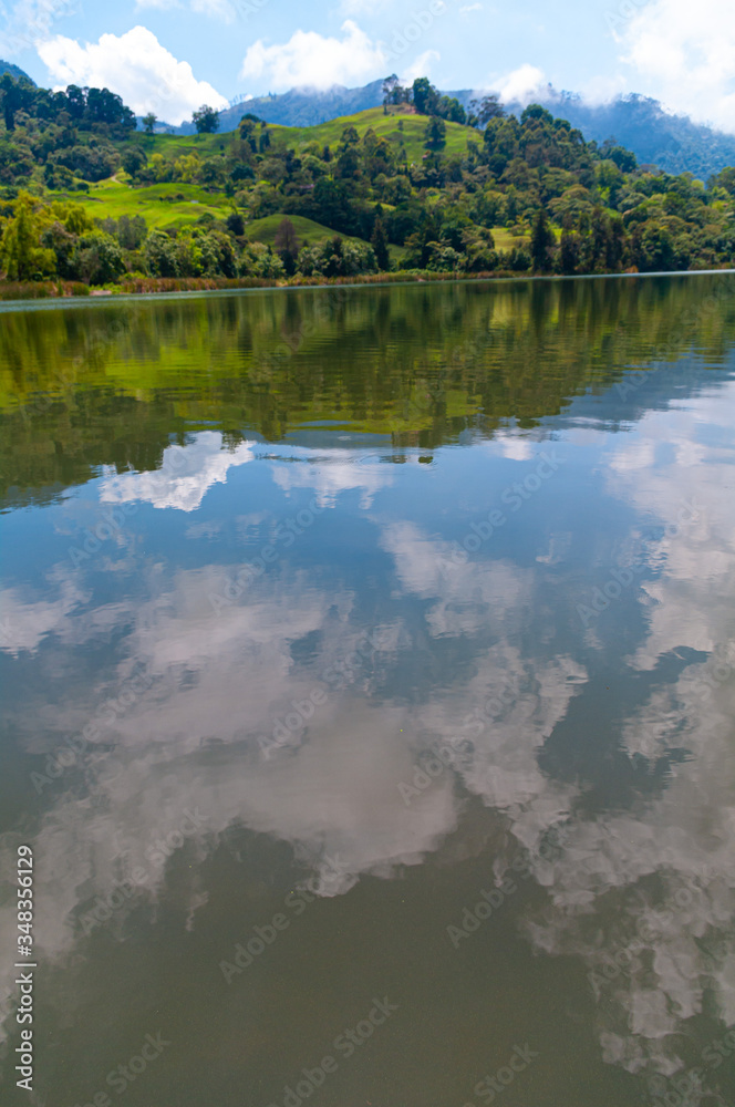 PedroPalo Lagoon reflecting the clouds on the surface.