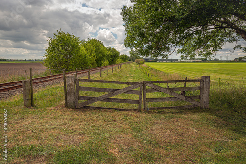 Closed wooden gate in a Dutch landscape