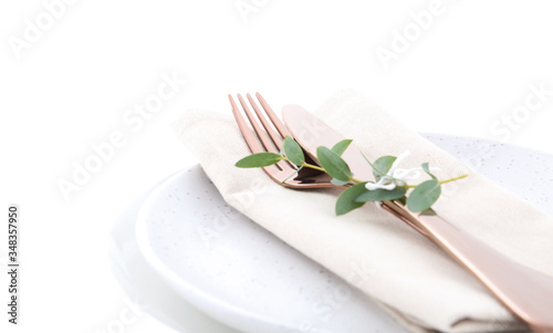 Stylish elegant table setting on white background