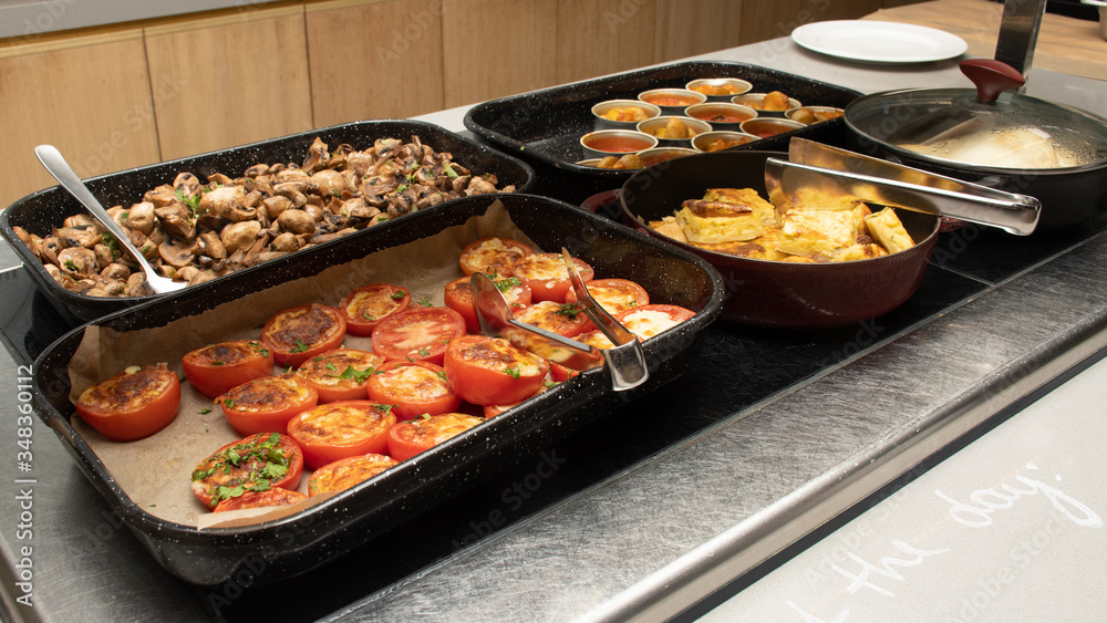 Selection of self service catering continental breakfast buffet display, catering or brunch table Selection of self service catering continental breakfast buffet display, catering or brunch table