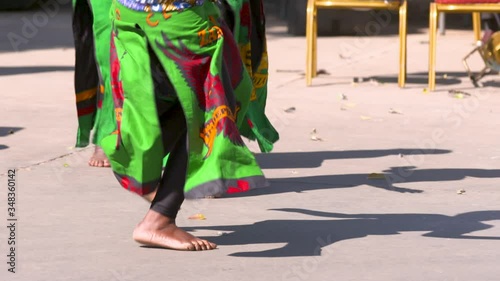 African dancer's feet dancing in traditional costumes in Zambia