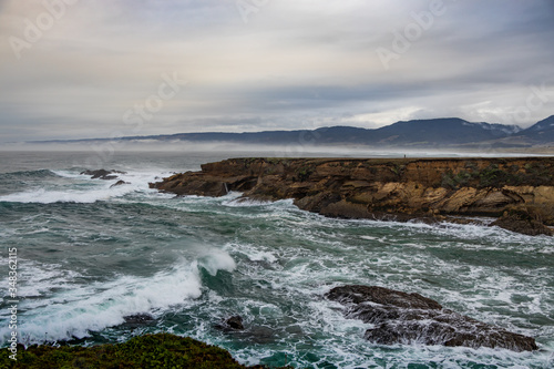 Waves breaking on the California coastline © Martina