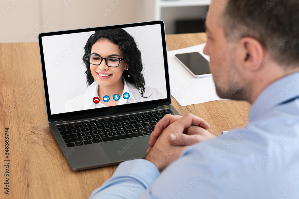 Workers having online discussion during video call at home Workers having online discussion during video call at home