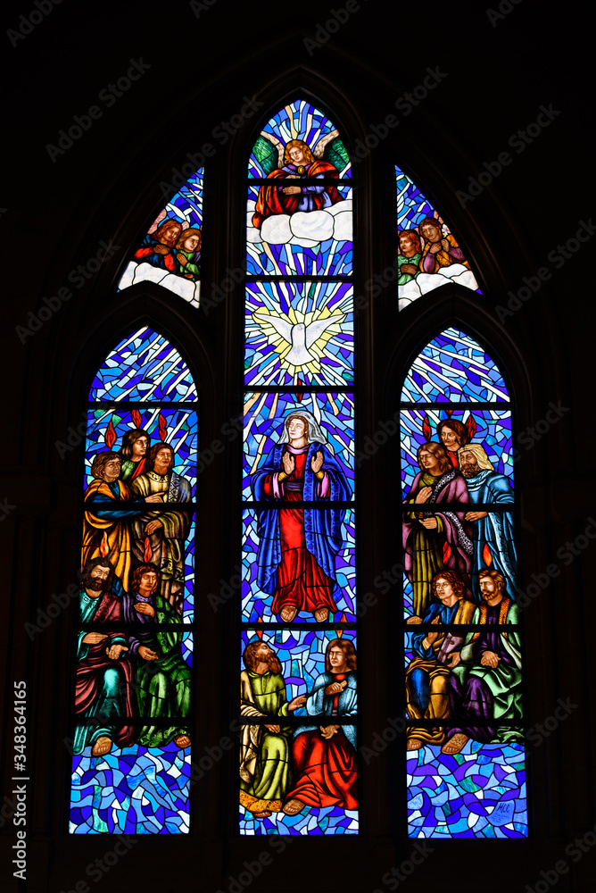 Stained glass window in Almudena Cathedral in Madrid, Spain
