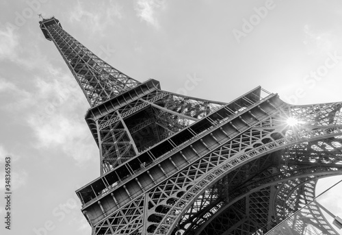 Low angle of the Eiffel tower in Paris, France / Black and white