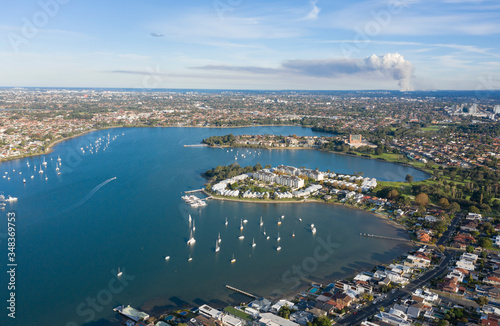 Photography The Sydney suburb of Canada Bay and  hen and chicken bay with back burning bush fire smoke coming from the Royal National Park in the South