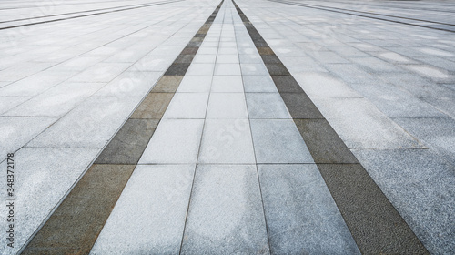 Perspective View of Monotone Gray Brick Stone on The Ground for Street Road. Sidewalk, Driveway, Pavers, Pavement in Vintage Design Flooring Square Pattern Texture Background