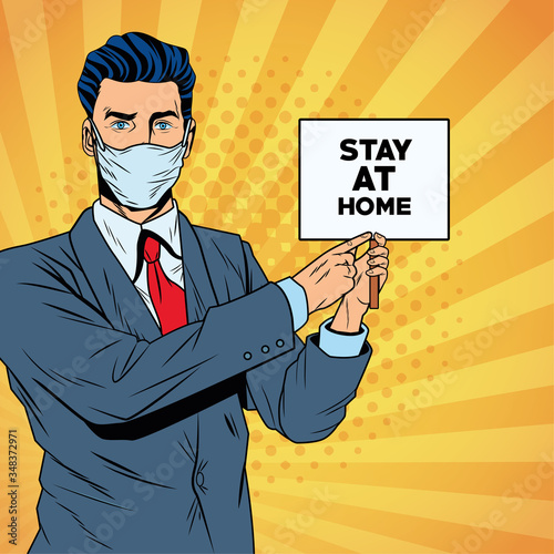 businessman using face mask for covid19 with stay at home banner
