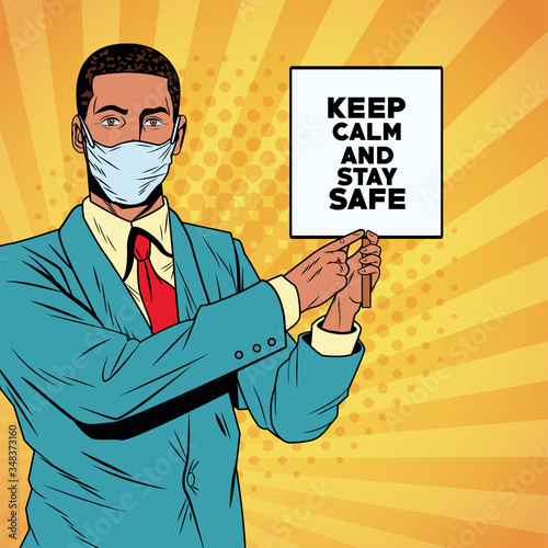 afro businessman using face mask for covid19 with keep calm banner