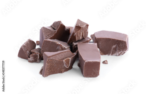 Pieces of milk chocolate isolated on white