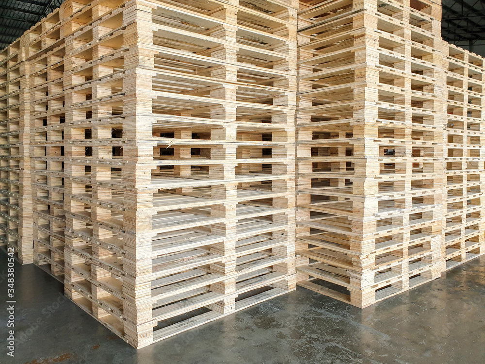 stack of wooden pallet in storage warehouse. material for Industry and transportation stack of wooden pallet in storage warehouse. material for Industry and transportation