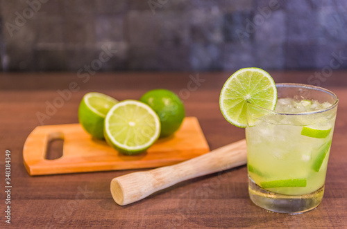 Caipirinha, traditional Brazilian alcoholic drink, typical drink made with sugar, lemon, distilled cane (cachaca) and ice.