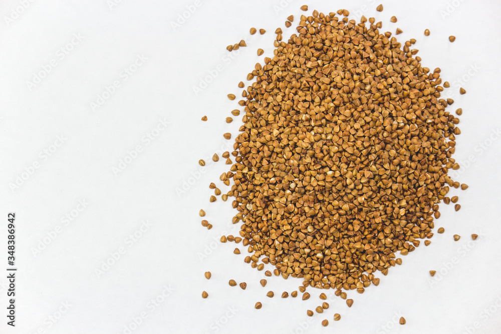 Buckwheat seeds closeup isolated on white background copy space Buckwheat seeds closeup isolated on white background copy space