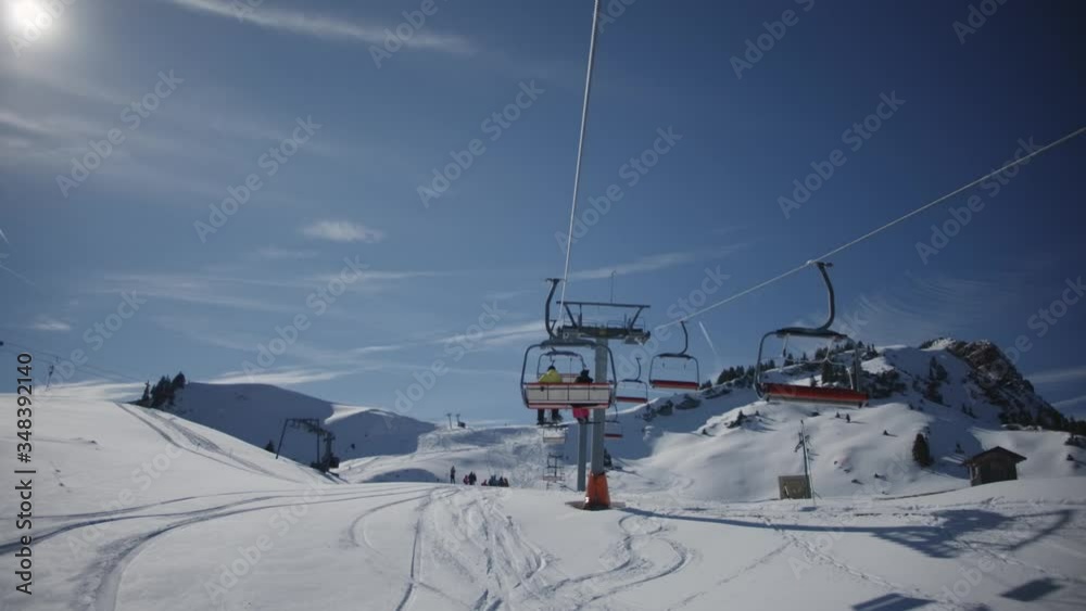 View from a chairlift on a Mountain in Germany (bavaria) in winter in slow motion View from a chairlift on a Mountain in Germany (bavaria) in winter in slow motion