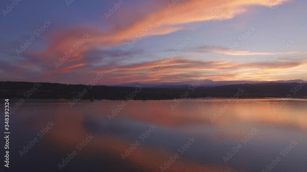 Incredibly Vibrant Sunset With Lake And Mountains Shot From Drone Incredibly Vibrant Sunset With Lake And Mountains Shot From Drone