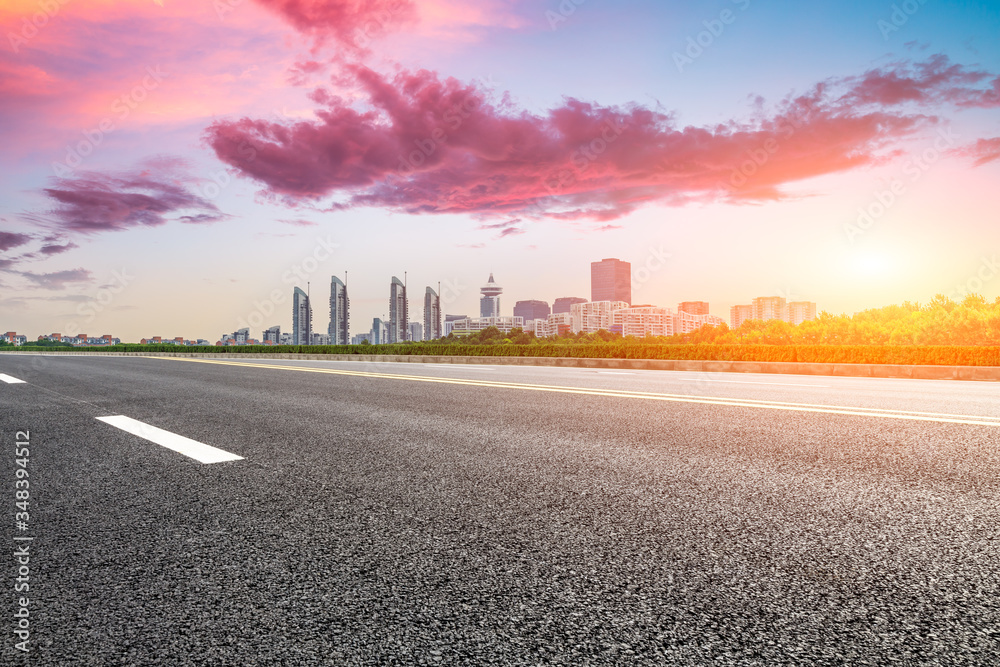 Fototapeta premium Asphalt road and city skyline with buildings in Shanghai,China.