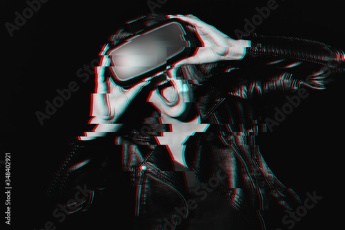 emotional girl in a headset virtual reality glasses
