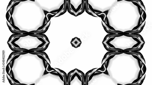 4k loop abstract animation with black and white tapes are twisted and form complex structures like symmetric ornament pattern. Seamless footage with luma matte as alpha channel. photo