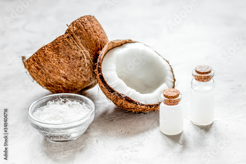 organic cosmetics with coconut on white background