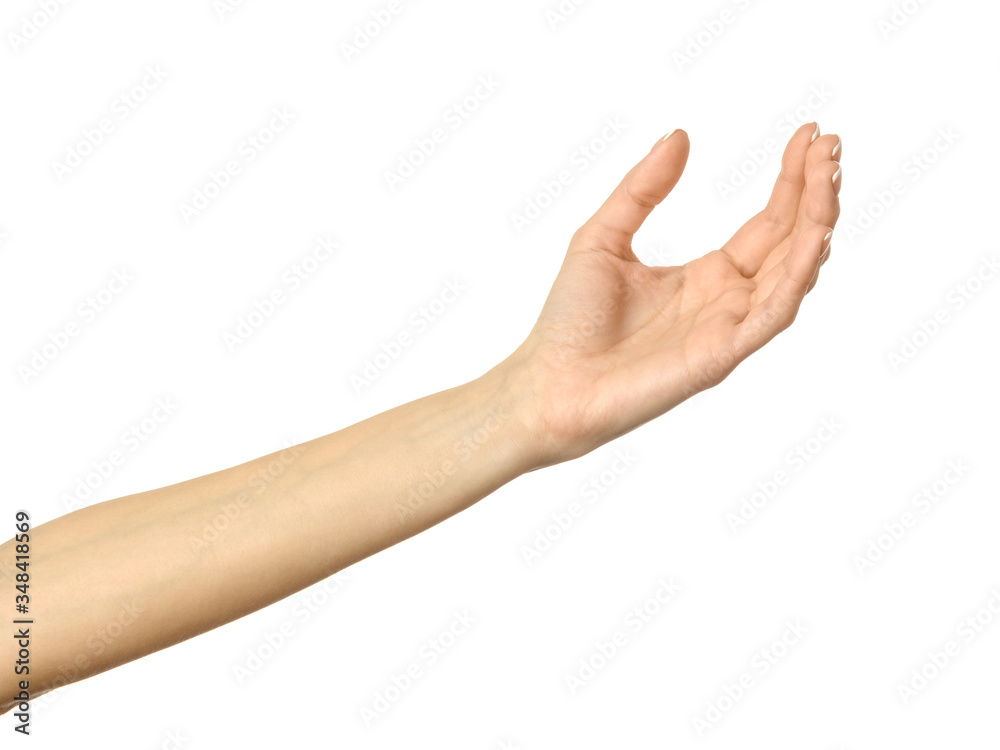Giving, reaching or holding hand. Woman hand gesturing isolated on white Giving, reaching or holding hand. Woman hand gesturing isolated on white