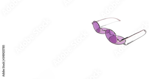 Blue sunglasses on the white background. Minimal summer concept. Copy space.Place for text and design. Isolated subject
