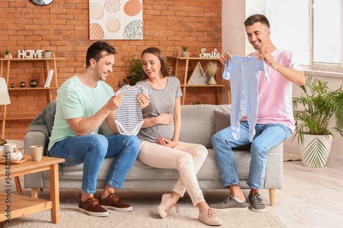 Gay couple and pregnant wom...