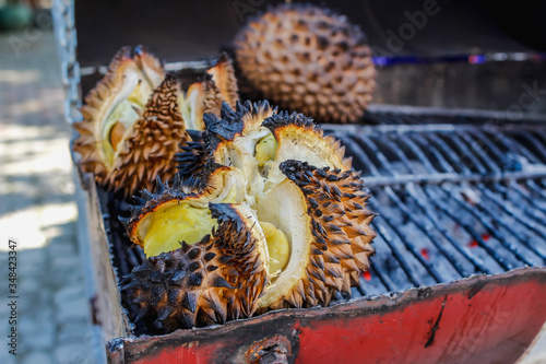 select Focus, Durian is placed over a charcoal stove that is heated to grill the durian from heat, adding a delicious taste and aroma. The name of the menu is called the durian burned menu. photo