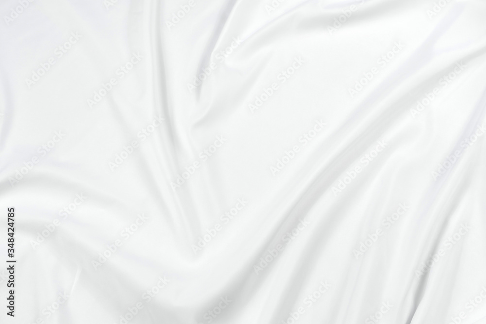 Abstract white fabric texture background. Cloth soft wave. Creases of satin, silk, and cotton.	
