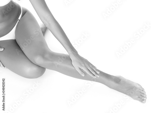 Female legs and hands  white background