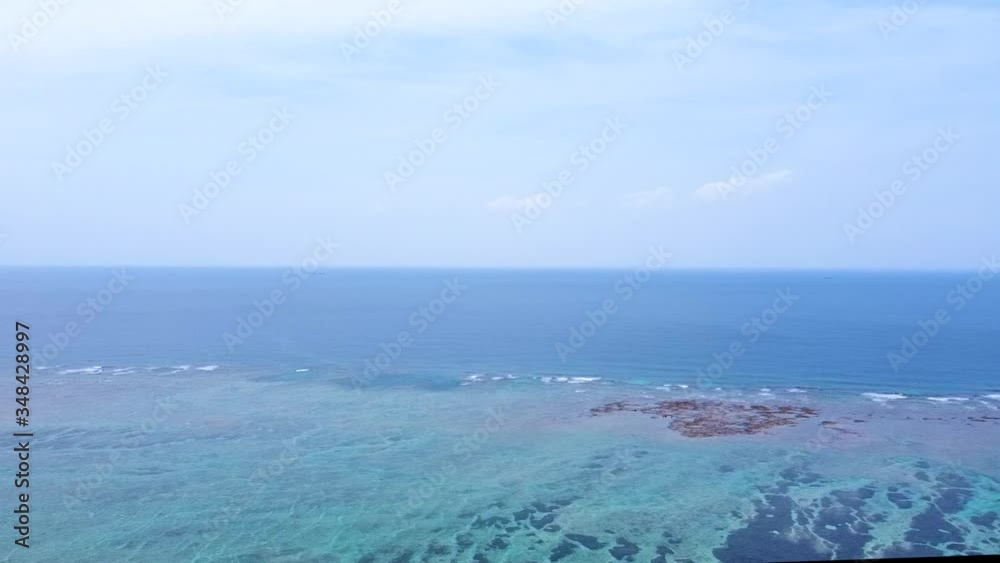 cloudy sky and blue ocean in Okinawa by drone cloudy sky and blue ocean in Okinawa by drone