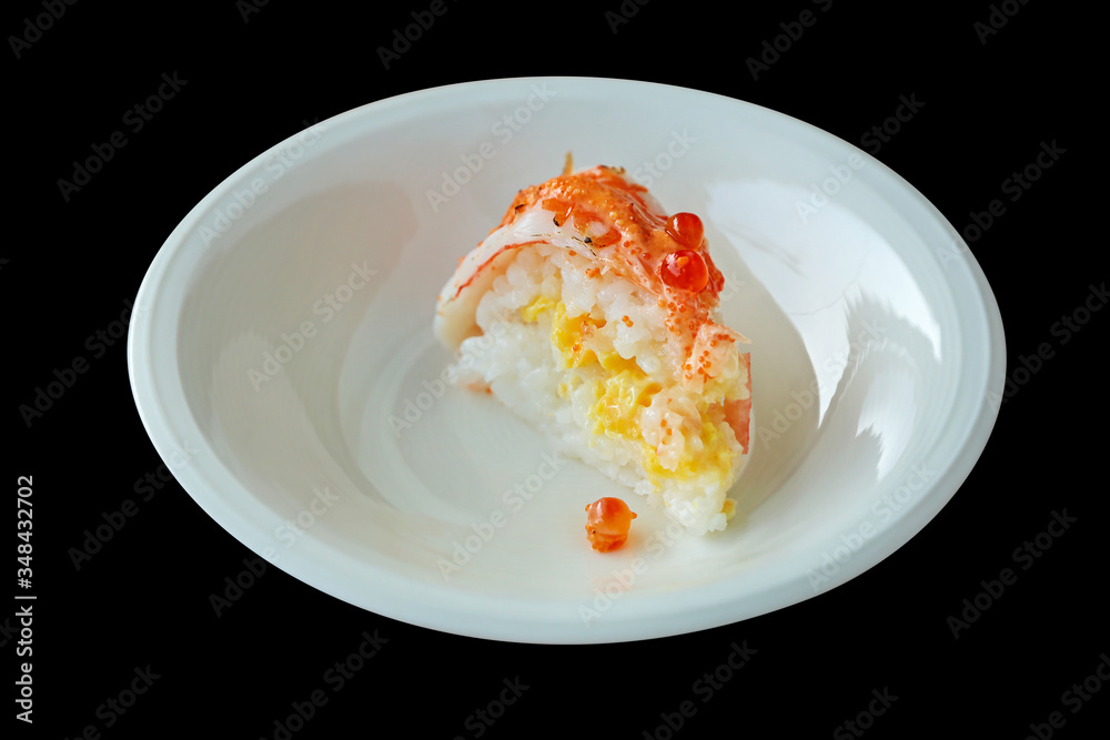 A piece of Salmon cake on white round plate. A piece of Salmon cake on white round plate.