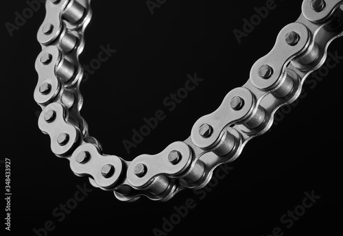 Konstfotografi roller chain on a black background
