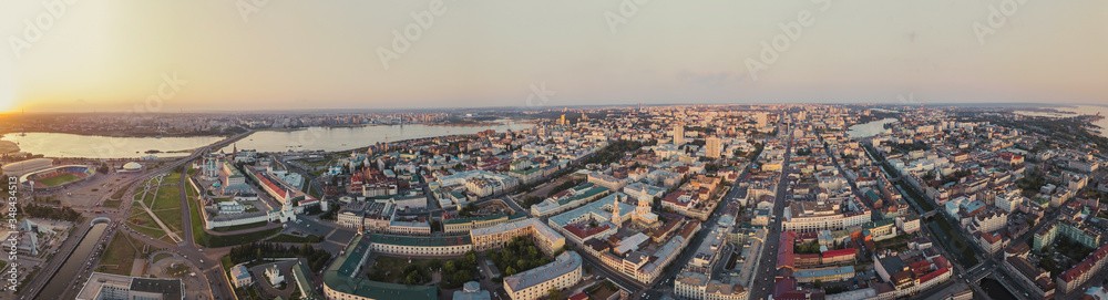 Beautiful panoramic picture of Kazan city center on the sunset, Tatarstan, Russia. Capital of the Republic of Tatarstan. Buildings and landmark line with sunny weather. Panorama of the sights.