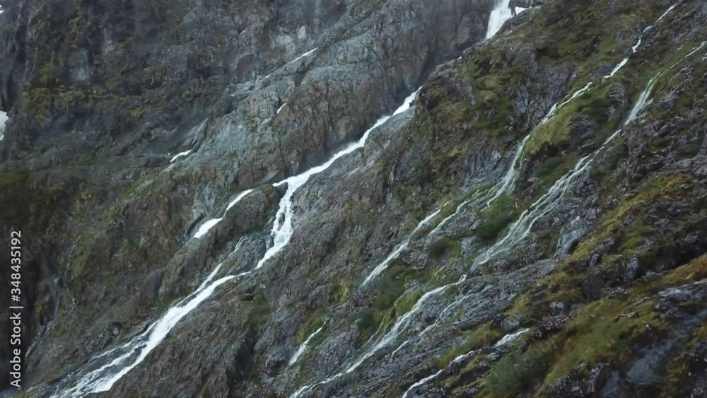 Queulat National Park, Chile. Drone Aerial View of Wild Alpine Snow Melted Waterfalls Queulat National Park, Chile. Drone Aerial View of Wild Alpine Snow Melted Waterfalls
