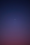 A moon during sunset