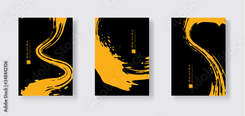 Yellow ink brush stroke on black background. Japanese style.