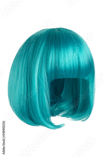 Subject shot of a bright turquoise wig with bangs. The short blunt bob wig is isolated on the white background. 