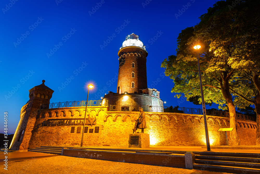 Fototapeta premium Night view of the lighthouse in Kolobrzeg, West Pomerania, Poland