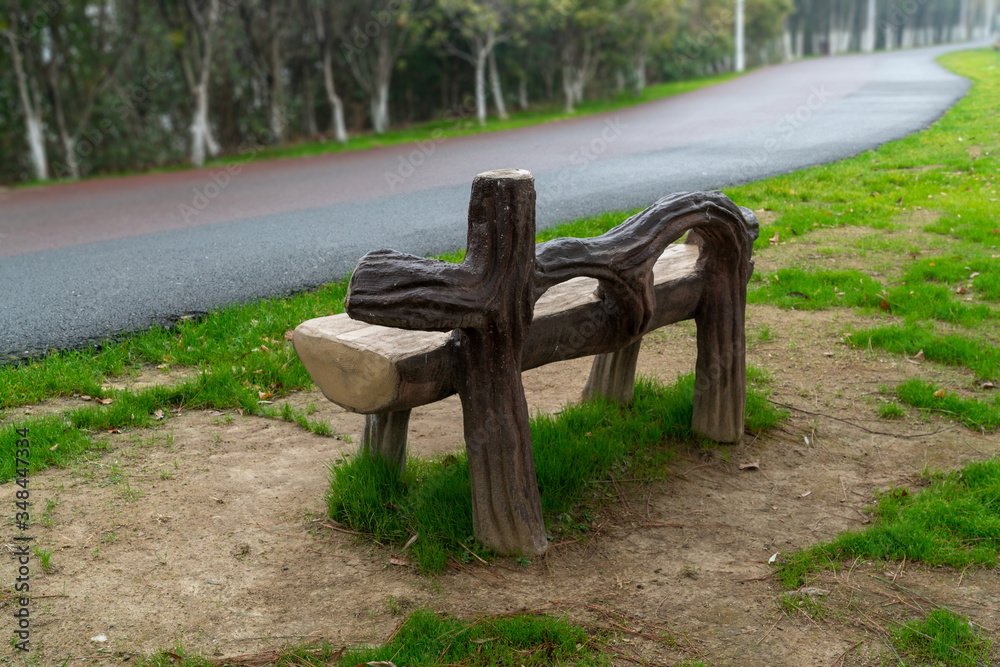 Wooden bench in the city park Wooden bench in the city park