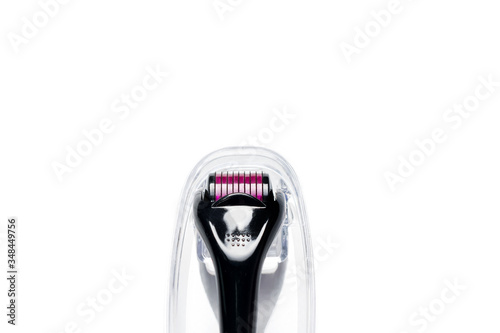 Derma roller isolated on white background. Beauty treatment, mesotherapy or medical collagen production stimulation. Micro needling therapy. Dermaroller, skin care procedures at home and in salon.