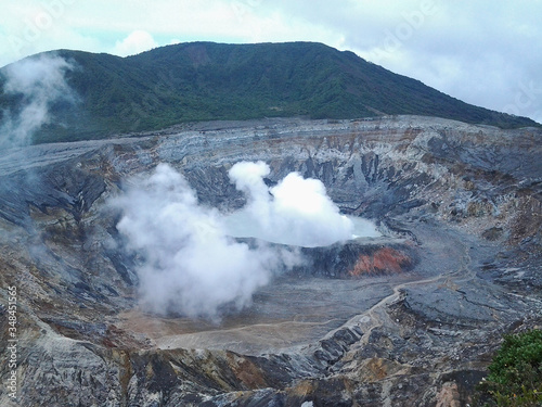 The smoking crater of the Poas volcano in Costa Rica, Central America